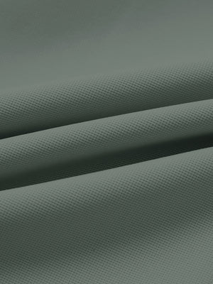Fabric close-up of lightweight moisture wicking dress pants, showing texture and finish in slate green.