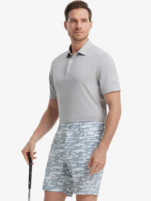 Model in LIGHT GREY Jacquard Polo posing with golf club — active and athletic on the front view