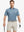 Model in Modern Fit Melange Polo GRAYISH BLUE HEATHER, front half-body holding golf club, relaxed style.