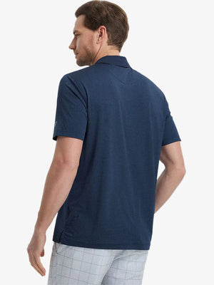 Back view from waist up showing the fit of NAVY 4 Way Stretch Jacquard Polo on model
