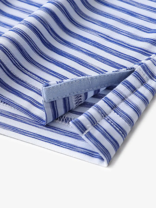 Close-up of hem slit detail on BLUE WHITE Unique Watercolour Stripe Polo