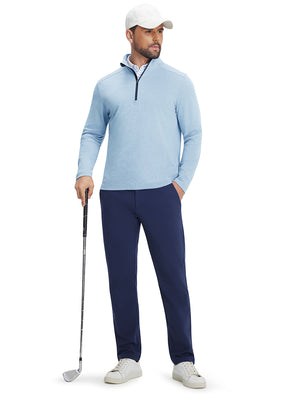 Front upper body view of model holding a golf club in light blue two tone pique cotton blend q-zip