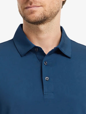 Close-up front (nose to chest) of Everyday Solid Jersey Polo in BLUE, showing vibrant fabric texture.