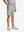 Front lower body in rose dust boys lightweight dry fit flat front golf shorts