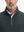 Close-up from nose to chest, showing collar detail and zipper of the dark grey golf vest.