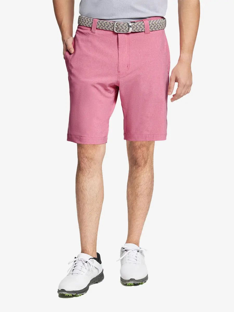 PINK 9 Inch Heather Performance Golf Shorts with front view, model's lower body and side pockets visible