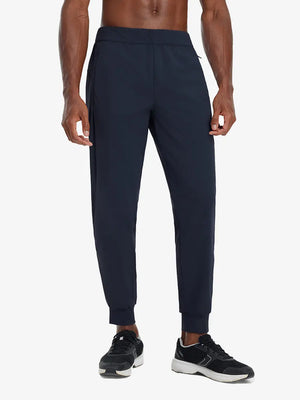 Front lower body view of model wearing NAVY Performance Tapered Sports Joggers