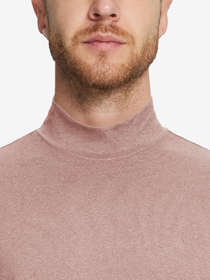 Close-up collar view from nose to chest, showing fine fabric texture of the Pink Heather turtleneck.