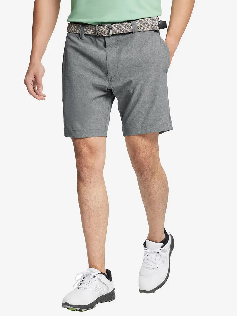 LIGHT GREY 7 Inch Heather Performance Golf Shorts with front view, model's lower body and side pockets visible