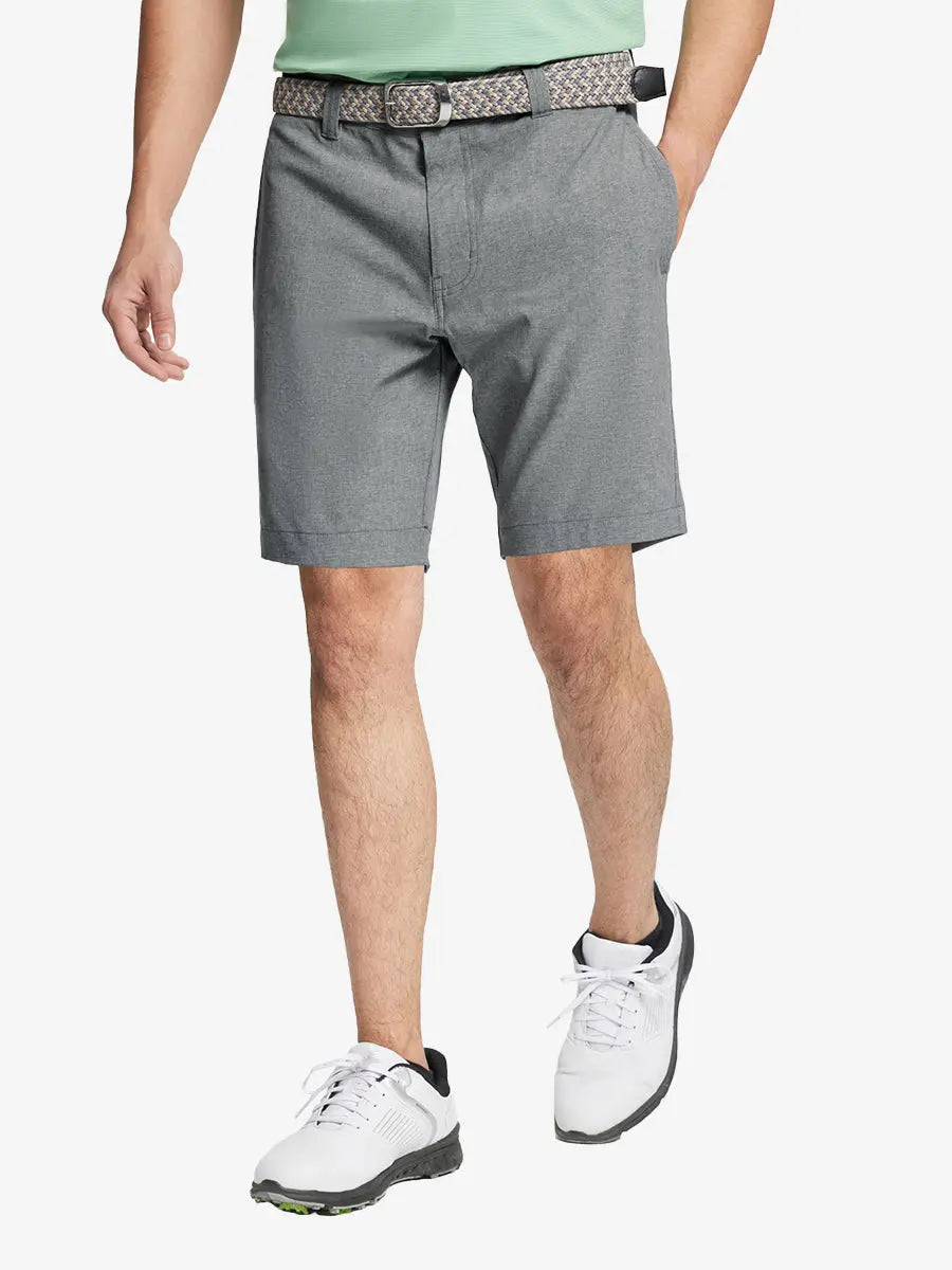 LIGHT GREY 9 Inch Heather Performance Golf Shorts with front view, model's lower body and side pockets visible