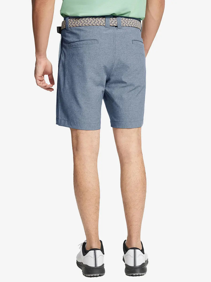 DARK BLUE 7 Inch Heather Performance Golf Shorts back view, model's lower body with hands in pockets