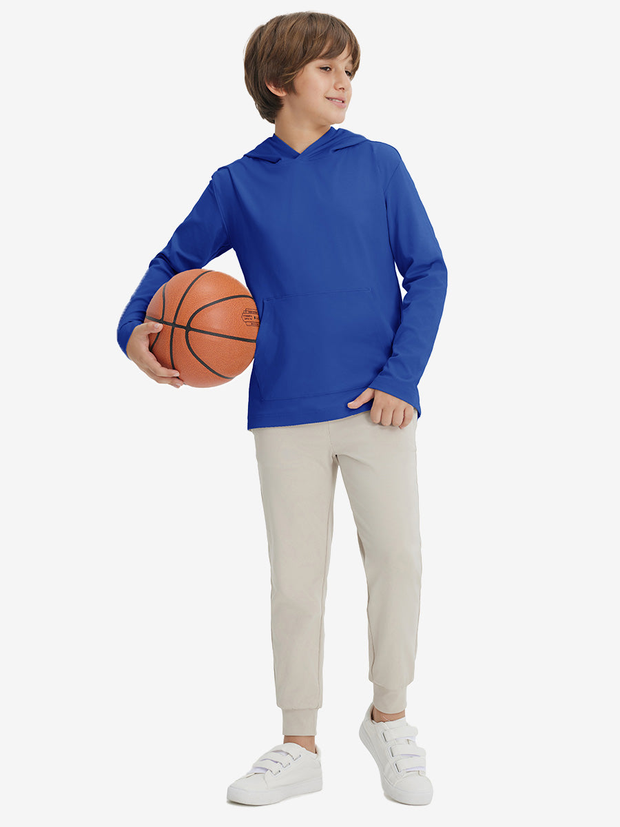 Full-body view of model holding basketball, wearing youth long sleeve hoodied with kangaroo pocket in klein blue.