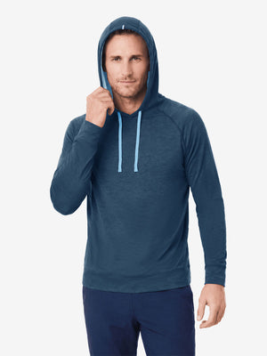 Model front upper body wearing view, heather midlayer golf hoodies in dark blue heather