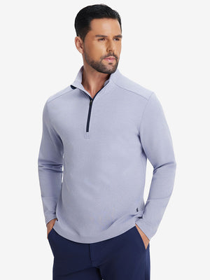 Front upper body shot of model in sky blue two tone pique cotton blend q-zip