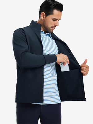 Model wearing water-resistant zip up golf jacket, navy, front upper-body with one hand in pocket.