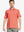 Front half-body view of male model in the Melon Everyday Classic Solid Polo, standing still