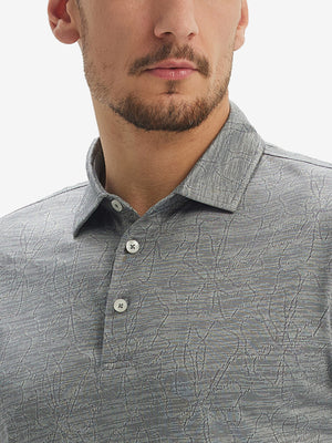 Front view from nose to chest of model wearing light grey flower breathable jacquard pattern 3-button golf polo