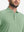 Front view from nose to chest of model wearing the spa green heather comfy cotton blend polo shirt with pocket, showcasing the upper fit