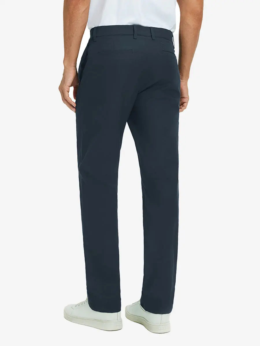 Rear lower leg view of Water Repellent 8 Pockets Pants in NAVY，showing fabric texture and fit.，showing fabric texture and fit.