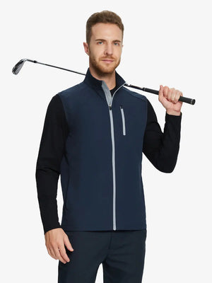wearing the navy windproof golf vest, holding a golf club, showcasing its stylish design and practical zippered pockets.