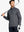 Half-body front view of model holding golf club in Pinstripe Quarter Zip Pullover – BLACK GREY MELANGE