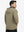 Back upper view of model in full zip fleece hoodied jacket, showing fit and seams in desert yellow.