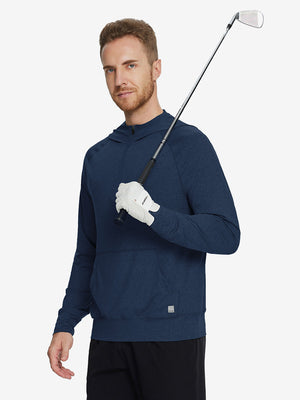 Male model holding a golf club, wearing the Quarter Zip Hoodie with Kangaroo Pocket in Cobalt Heather.