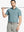 Model in GREEN ASH STRIPE Pinstripe Jersey Performance Polo holding golf club, front half-body view								
