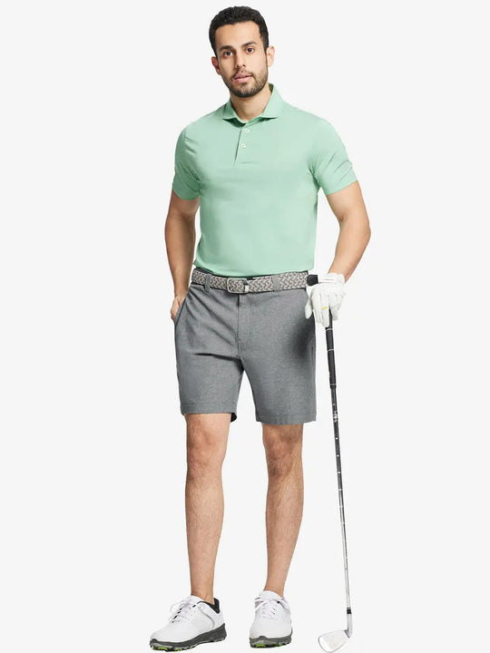 Full body front view of model wearing LIGHT GREY 7 Inch Heather Performance Golf Shorts, holding a golf club