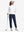 Full-body front view of model wearing women's stretch fleece lined water resistant joggers in navy.