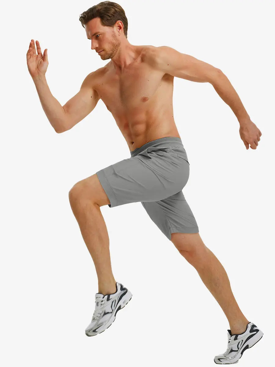 NEUTRAL GREY 9 Inch Performance Active Shorts running action full view