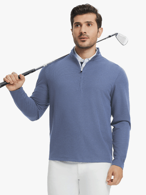 Full body model holding golf club in Premium jacquard quarter zip pullover, colony blue style