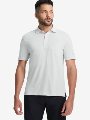 Front half-body shot of model wearing the blue presence heather comfy cotton blend polo shirt with pocket for a casual relaxed look