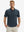Front waist-up shot of model wearing navy coconut tree breathable jacquard pattern 3-button golf polo