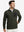 Model with one hand in side pocket, wearing midweight warm stretchy quarter zip pullover in forest green.