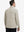 Back upper body view of the khaki light lightweight golf pullover, model turns head slightly with ease.