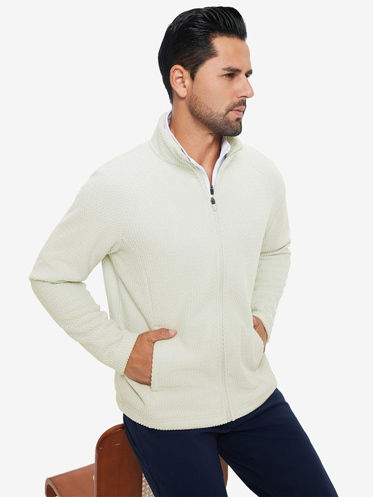 Model with both hands in pockets, wearing soft winter fleece jackets in beige, warm and relaxed.