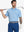Half-body front view of model holding golf club wearing BLUE HEATHER Premium Stretch Heather Polo.