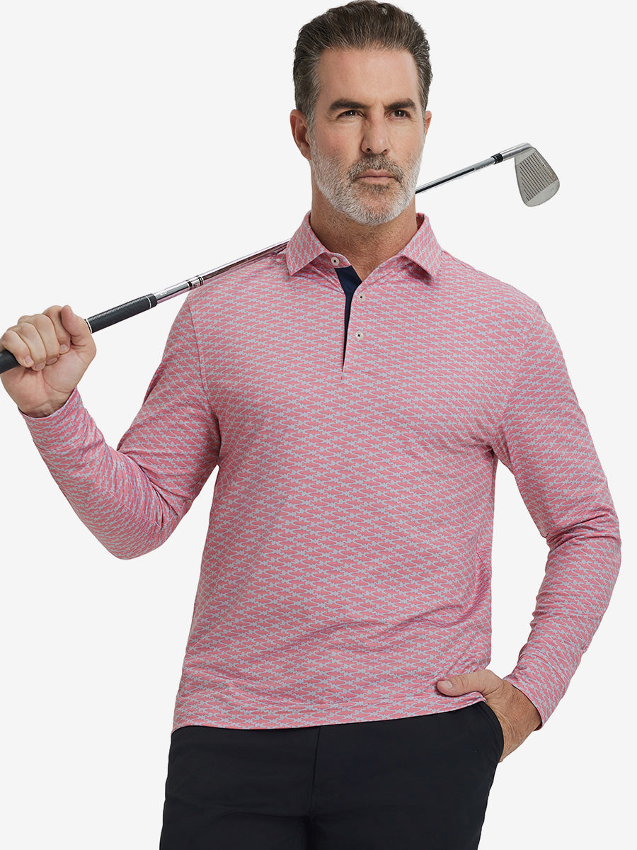 Model holding golf club, wearing lightweight print long sleeve polo in pink small fish, casual sporty fit.