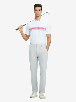 Full-body shot of model holding golf club, styled with quick dry casual dress pants in glacier grey.