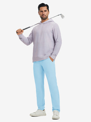 Model holding a golf club on shoulder, wearing light blue water-resistant golf stretch nylon pants.
