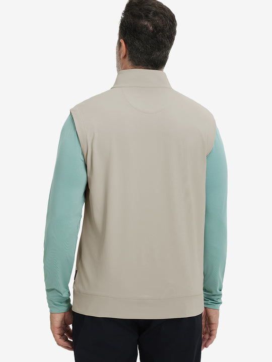 Back upper body view of the khaki light print collar quarter zip golf vest, clean cut and relaxed posture.