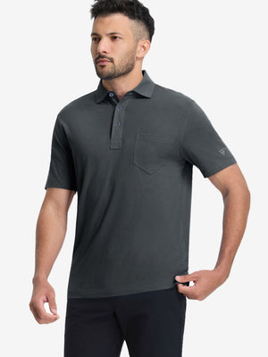 Front half-body shot of model wearing the greystone heather comfy cotton blend polo shirt with pocket for a casual relaxed look