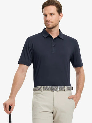 Model wearing Everyday Solid Jersey Polo in DARK GREY, front half-body with golf club in hand.
