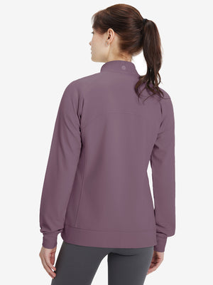Women's Water-Resistant Stretch Fleece Lined Jacket in light pinkish purple, back upper body view