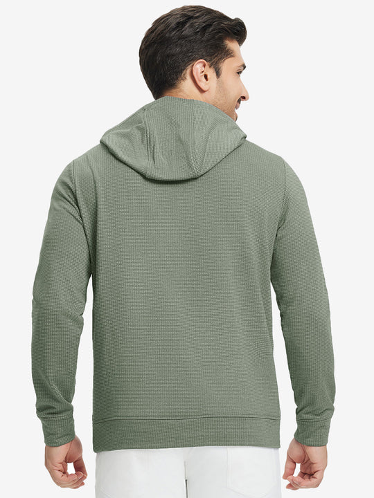 Back upper view of model in warm fleece golf hoodies pullover green.