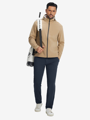 Model carrying a tennis bag, wearing navy soft lightweight casual golf pants with 5 pockets.