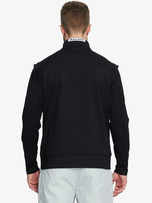 Back half-body view of model in BLACK Stretch Solid Fleece Quarter-Zip Vest.								
