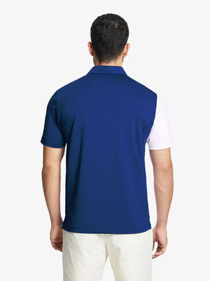 Back half-body view of model in KLEIN BLUE Moisture Wicking Color Block Polo Shirt.
