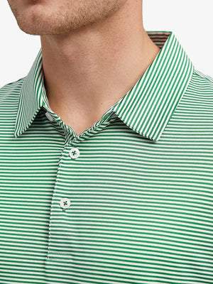 Close-up front view from model’s nose to chest in Cooling Stripe Golf Shirt – EMERALD STRIPE, showcasing vibrant green stripes